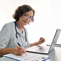 doctor using laptop computer